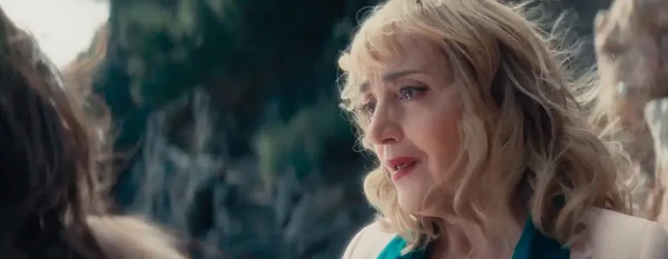A woman appears emotional in a scene from "La Source du mal".